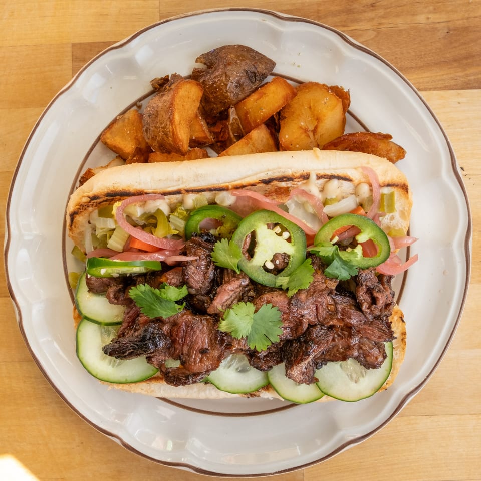 B'Gabs Comfort Cafe's healthy steak sandwich with cucumbers, jalapenos, cilantro, and roasted potatoes.
