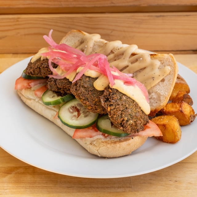 Veggie Lover Sandwich with Fried Potatoes.